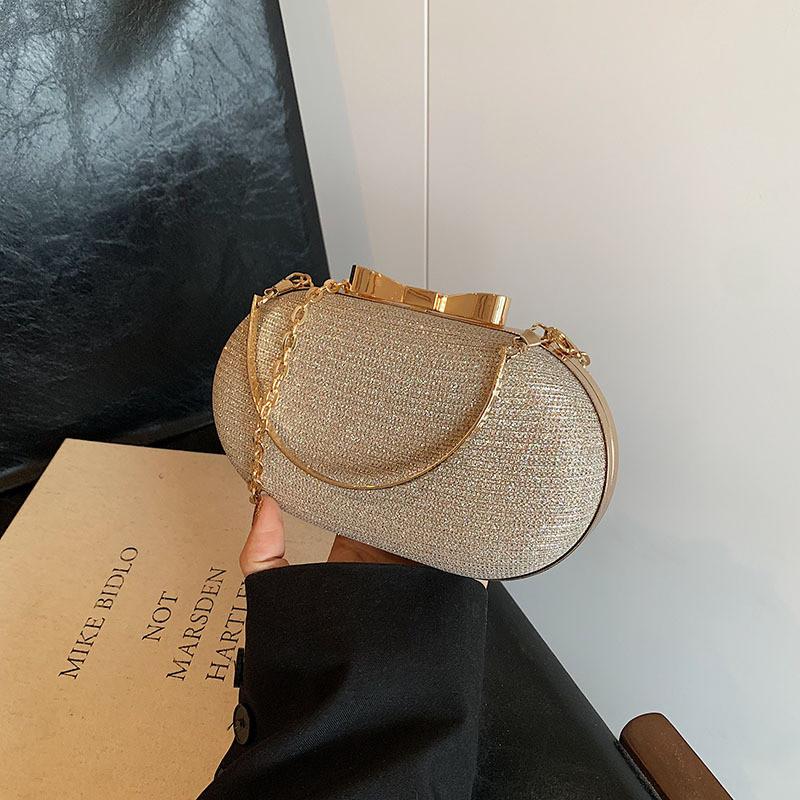 

Elegant Oval Shaped Crossbody Bag For Women With Chic Chain Design In Various Colors золотий