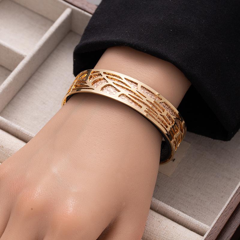 Fashion double-sided color pu leather wide bracelet women's hollow pattern titanium steel open bracelet