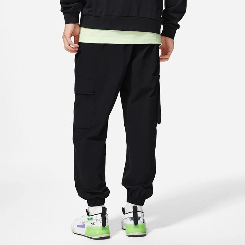Li-Ning Sports Trend Series Logo Zip Pocket Loose Cuff Sweatpants Men Bottoms Black AYKS833-2