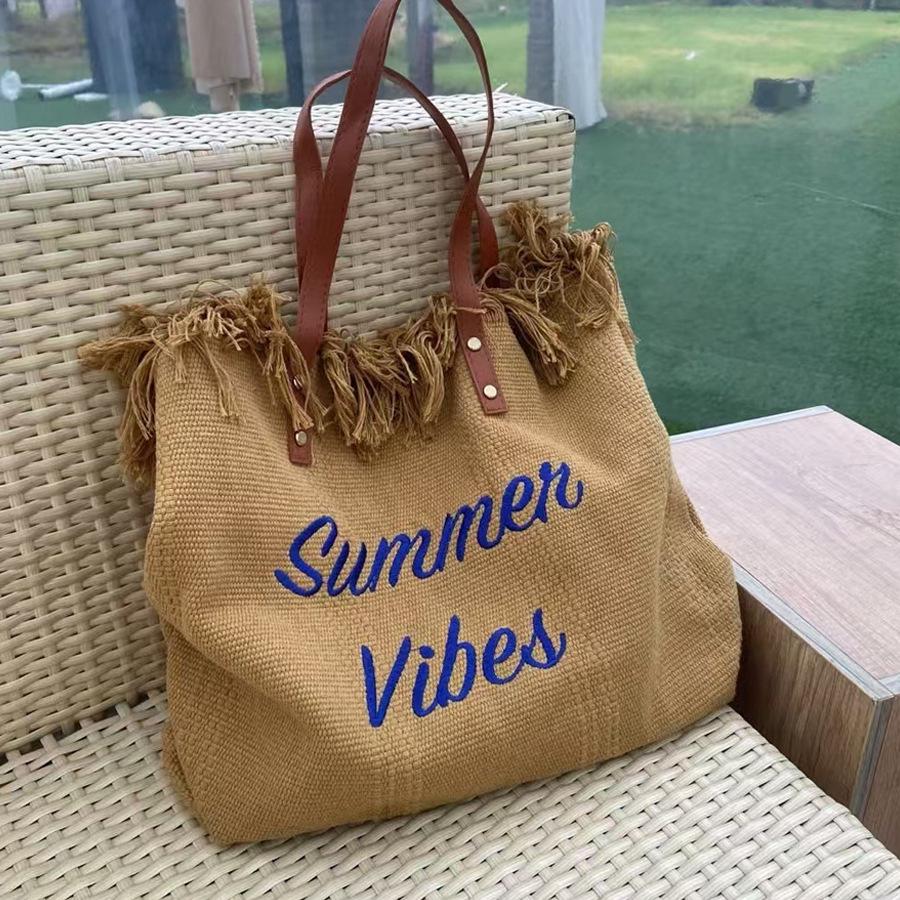 Korean Canvas Embroidered Tote: Versatile Women's Woven Beach Handbag with Tassel