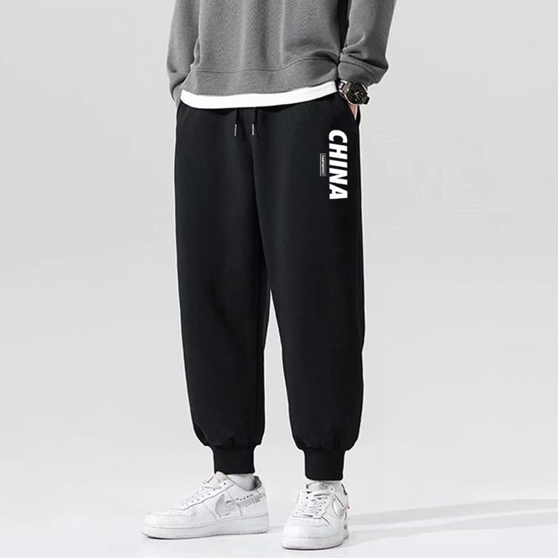 Casual sweatpants men's autumn and winter new large size tied feet thickened trendy printed velvet pants