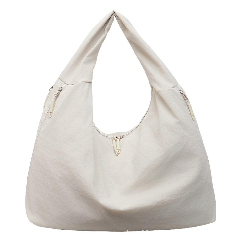 2025 New Large Capacity Versatile Portable Canvas Bag Premium Sense Tote Bag Fashion Commuter Underarm Shoulder Bag Women