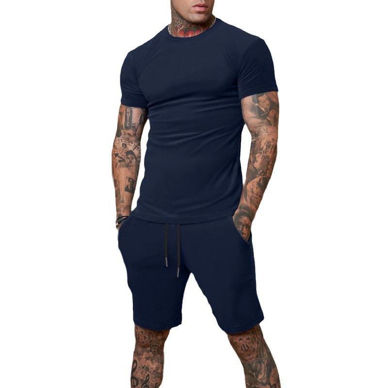 Conjunto de Camiseta de Manga Corta y Pantalones Cortos de Color Sólido para Hombre de Verano - Transpirable y Elegante.