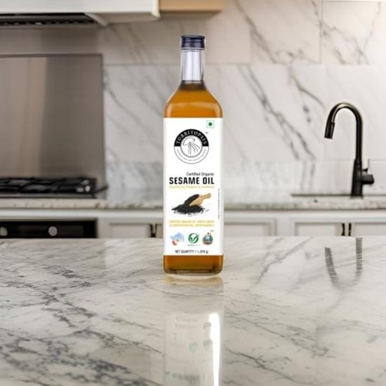 

Turritopsis Sesame Cooking Oil Gingelly Cold Pressed Certified USDA Organic Edible also for Hair Skin and Body Massage 1 Litre Pack of 1