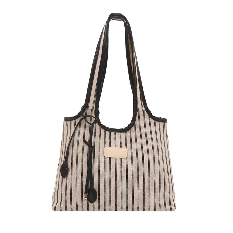 2025 New Niche Shoulder Bag Striped Simple Tote Bag Simple Versatile Portable Color Matching Armpit Bag
