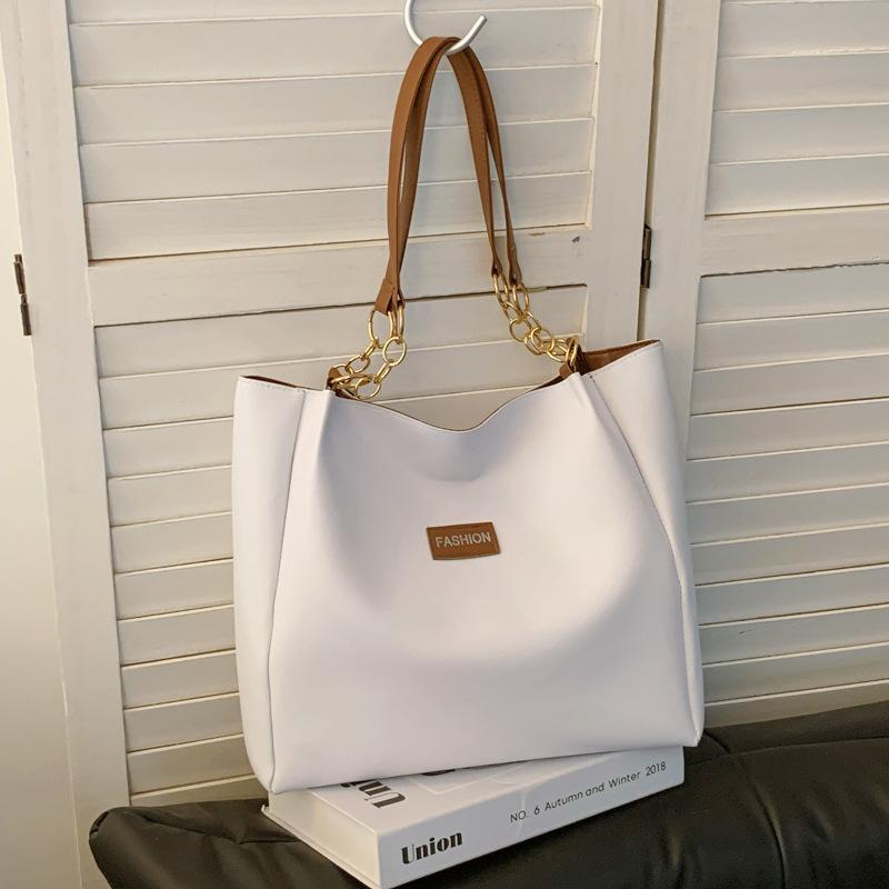 

College students class tote bag women 2025 new trendy high-end shoulder bag large capacity fashionable versatile commuter bag коричневий