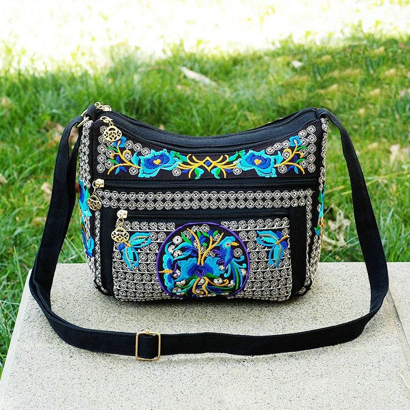 

Этнические сумки Вышитые женские сумки через плечо Комплексная вышивка Crossbody Маленькая сумка-пельмень Четыре косых Crossbody синий