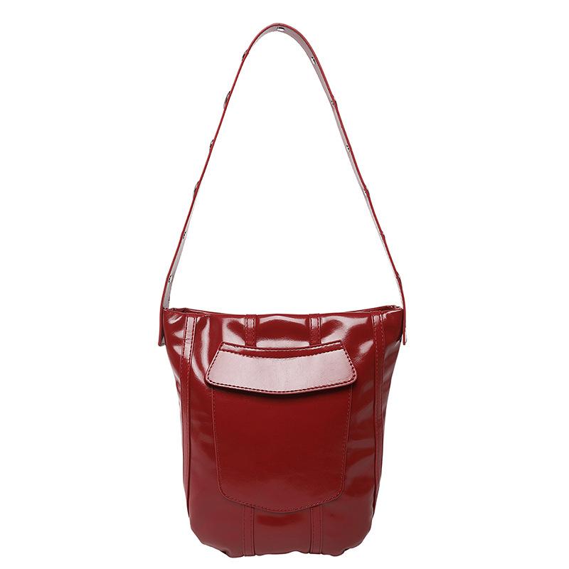 

Korean niche design bucket bag, female tide 2025 new summer popular texture shoulder messenger bag червоний
