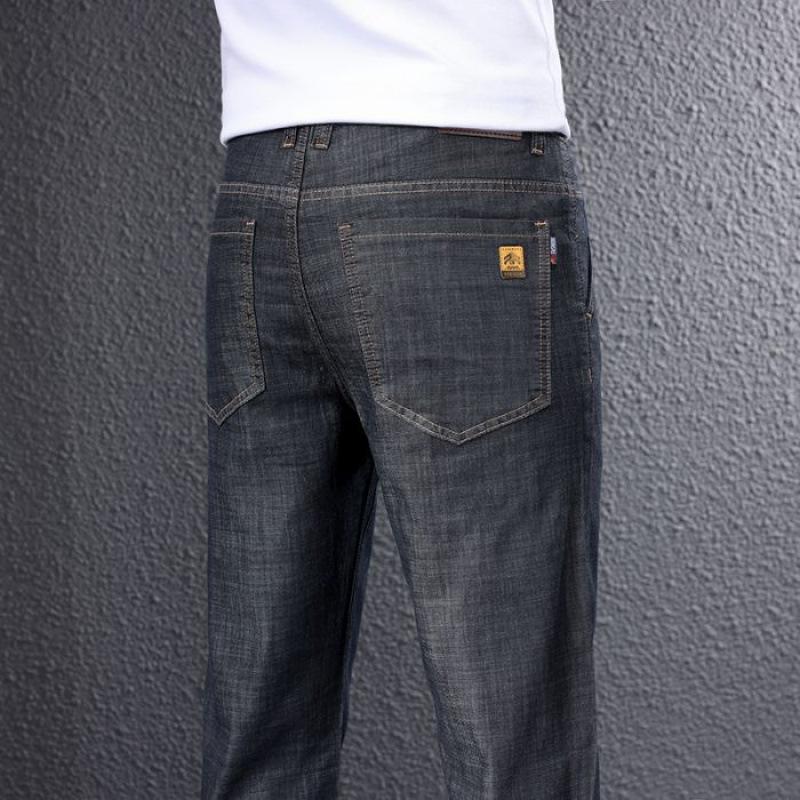 JYL Thin men's jeans, elastic trousers for business daily wide straight-through.