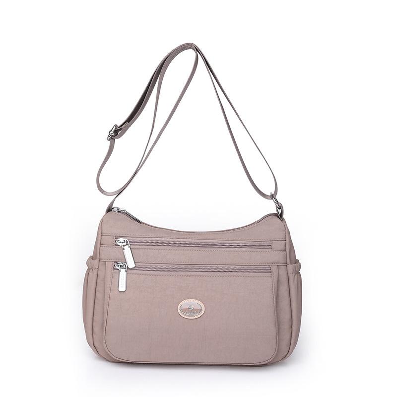 Bag 2025 new shoulder messenger bag nylon bag casual dumpling bag women's bag trend light luxury