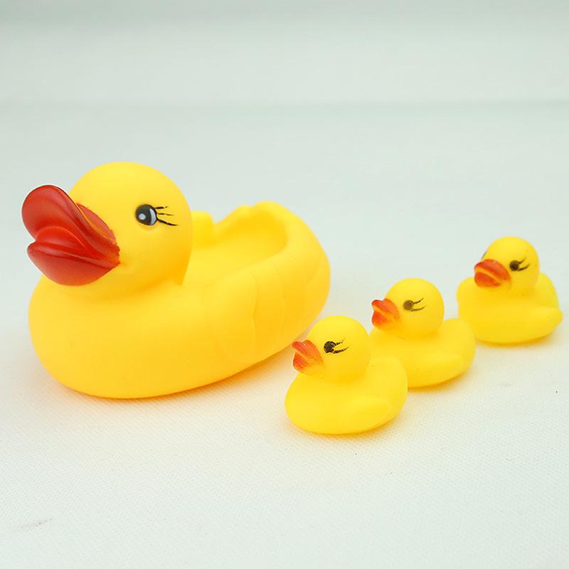 Playful Yellow Duck Bath Toy Set: Mother Duck & Three Ducklings - Soft Rubber Squeeze & Squeak