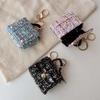 Fashion Mini Bag Keychain: Charm Pendant, Backpack, Handbag, Coin Purse, and Earphone Storage.