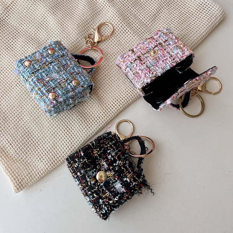Fashion Mini Bag Keychain: Charm Pendant, Backpack, Handbag, Coin Purse, and Earphone Storage.