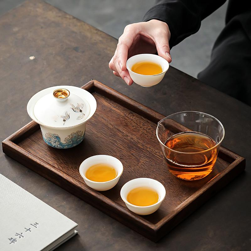 Ceramic travel tea set, one pot, three cups of Kuaike cup, outdoor round road car portable camping Kung Fu tea set