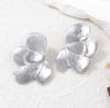 Exaggerated fashion personality retro design sense alloy light luxury temperament petal flower shape women's stud earrings