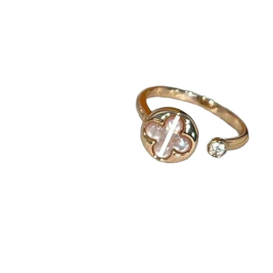 

Donkey V Gold High-Pointed Four-Leaf Clover Ring - Women’s Luxurious Mother-of-Pearl 18K Gold Plated. Pink Mother-of-Pearl Pointed Flower Ring