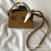 Go out handbag women's 2025 new high-end retro suede shoulder bag commuter messenger small square bag
