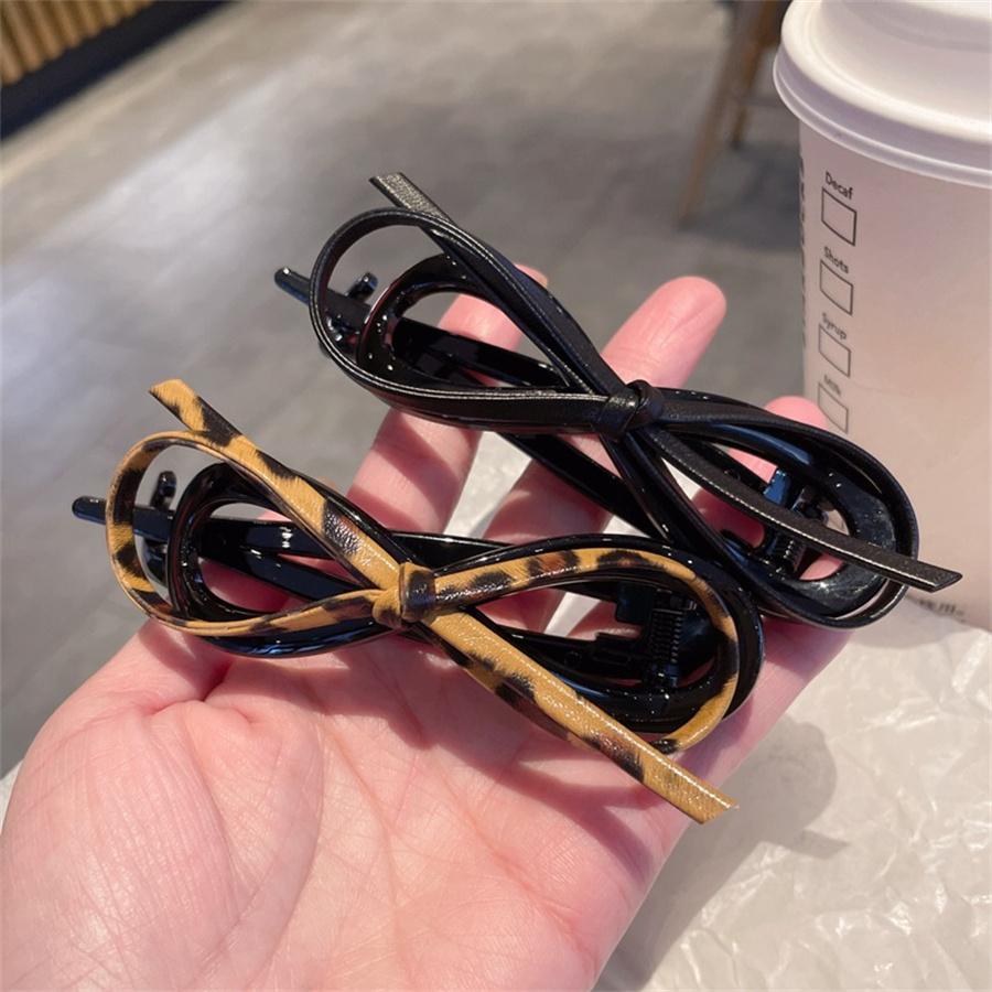 Product temperament leather bow twisted clip for women's back of head, high-end feeling, one-line clip for  hair accessories