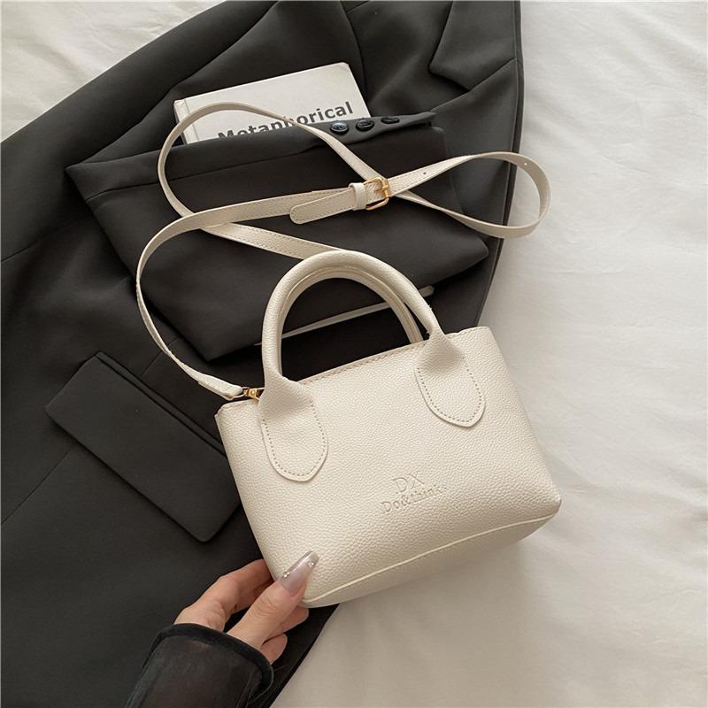 Sommer neue Persönlichkeit Trend kleine quadratische Tasche Mode lässig einfache Damen Nische Schulter Umhängetasche