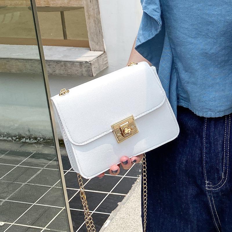 Women's bag lid type personalized lock small square bag autumn and winter new oblique span change small bag