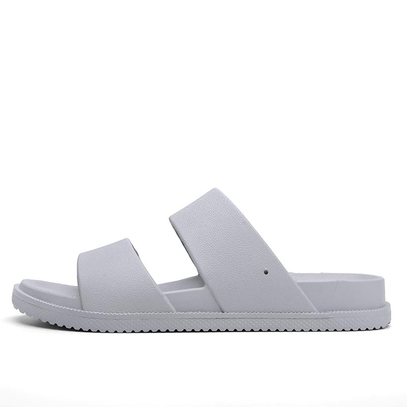 

Оригінальні нові чоловічі тапочки. Модний тренд. Дихаюче взуття. Пляжне взуття. Ванна кімната. 45 сірий