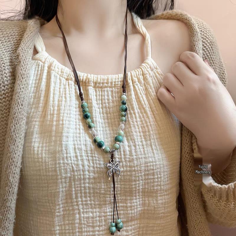 Bohemian Ethnic Style Long Bow Metal Necklace with Vintage Distressed Pendant (2025)