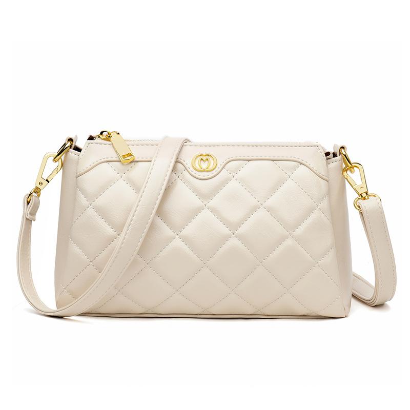 

Bag women s 2025 new Korean version of fashion Lingge commuter mom bag one shoulder armpit bag middle-aged women s crossbody bag