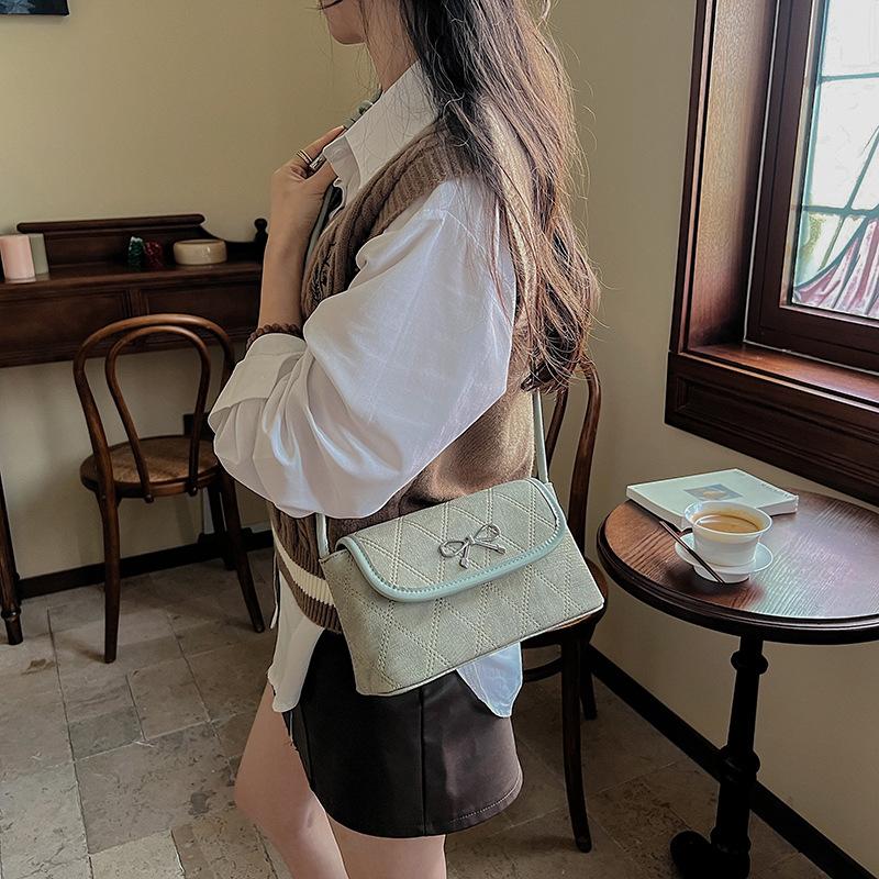 Simple and fashionable bow underarm bag 2025 new niche high-end commuter shoulder oblique span bag