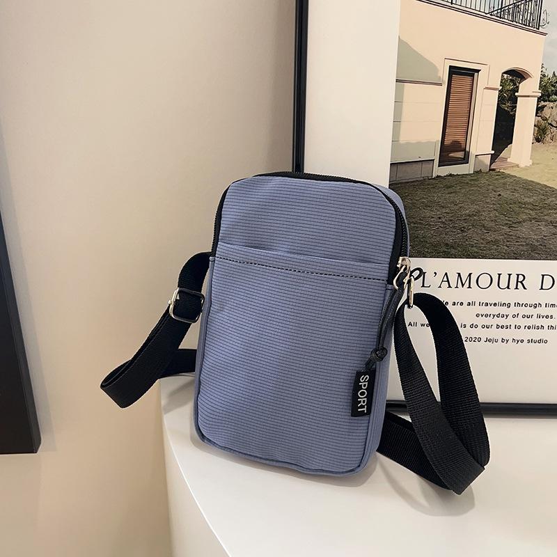 Multi-color mobile phone bag, large-capacity shoulder bag, simple and fashionable messenger bag, solid color change bag, nylon small backpack.