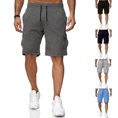 Pánské jednobarevné prodyšné běžecké šortky s kapsami a stahovací šňůrkou, ležérní šortky