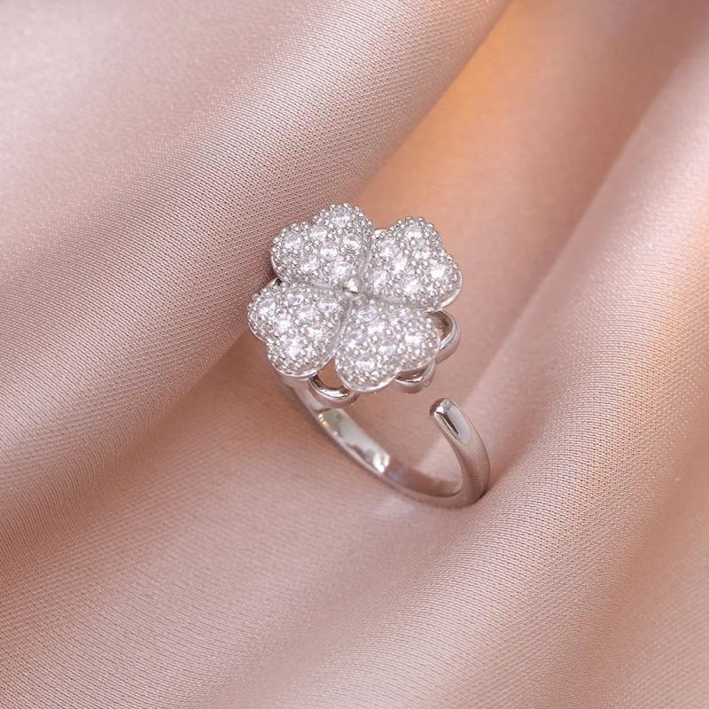 1 Stück neuer Mode drehbarer vierblättriger Zirkon offener verstellbarer Ring Luxus Nischendesign High-End Sinn für Schmuck