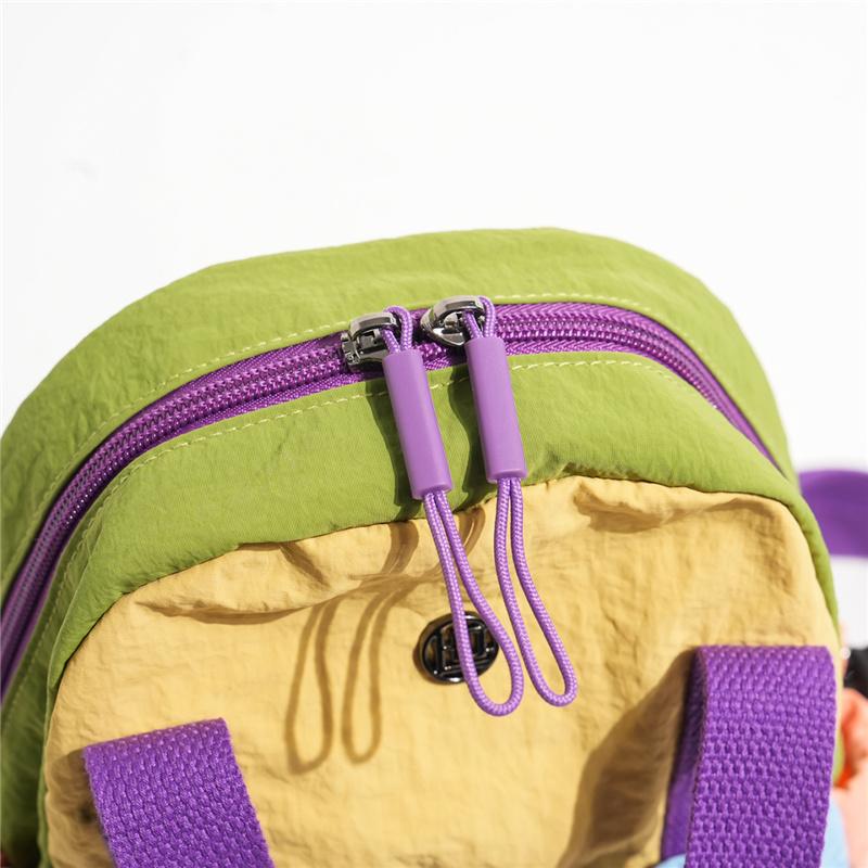 Color Block Backpack with Front Drawstring Pocket and Dual Carrying Options