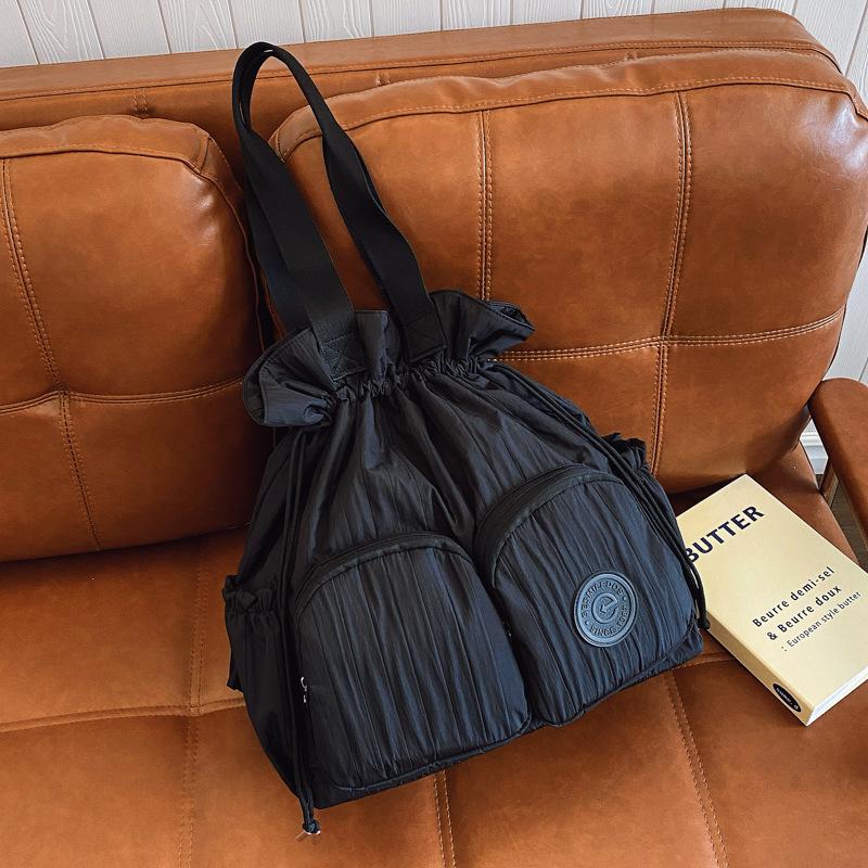 

2025 summer new large-capacity leisure foreign style backpack drawstring commuting light college student class shoulder bag чёрный