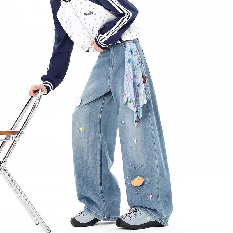 

Унісекс широкі джинси BWKA із вишивкою зірок та картатим шарфом XL