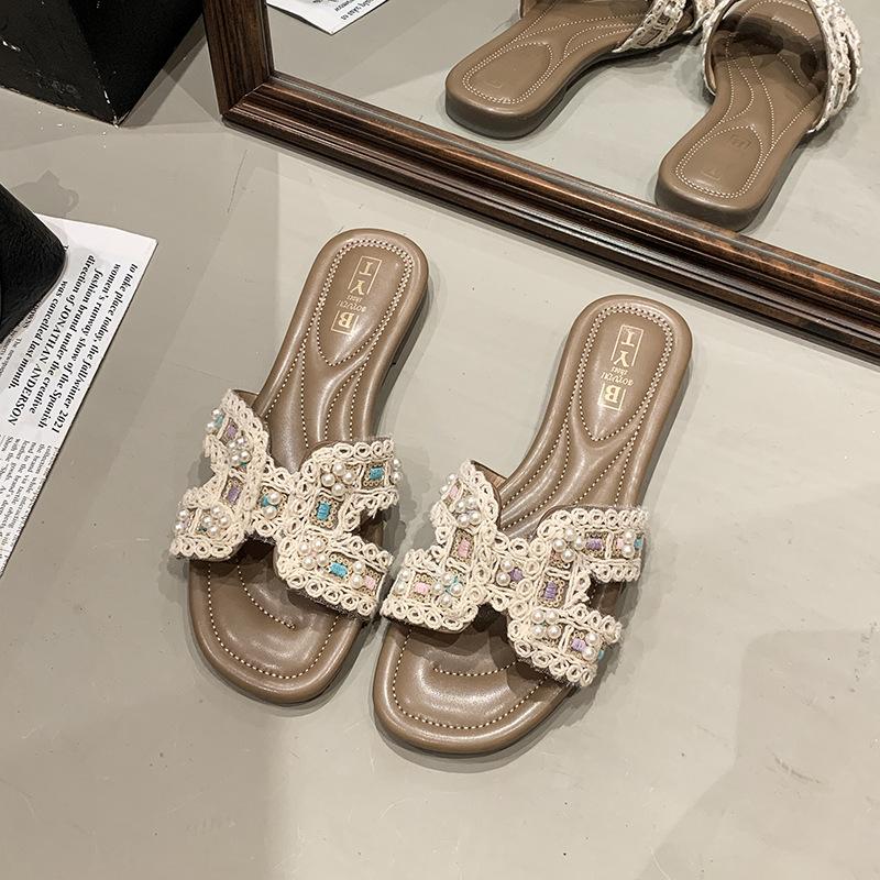Beautiful flat-bottomed cool slippers for women to wear 2025 summer new fairy style with skirt half-drag beach sandals