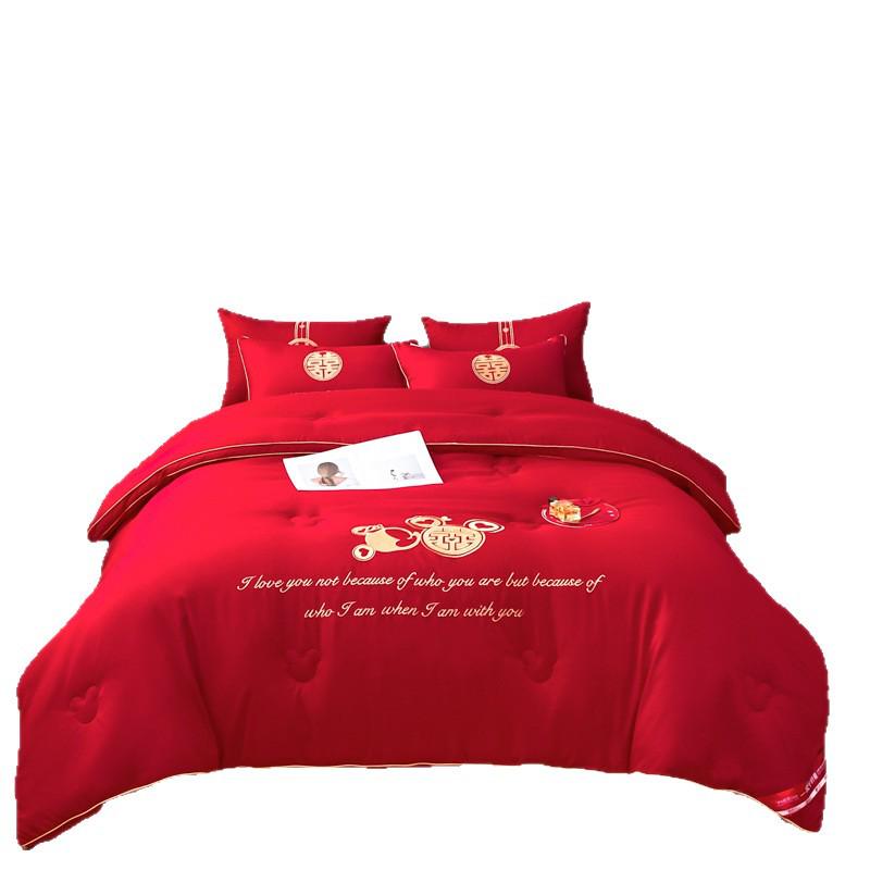 Four-Piece Red Bridal Chamber Wedding Bedding Set with Embroidered Duvet Cover and Bed Sheet.