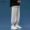 Solid color pants men's autumn new spring and autumn tooling casual trousers loose versatile tied nine-point trousers