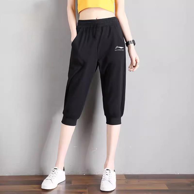 Li Ning Sports Lifestyle Series Solid Color Mid Waist Comfortable Versatile Breathable Tapered Three Quarter Knitted Sports Pants AKQU431-1