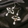 Retro Chinese Style Hollow Fan-shaped Earrings