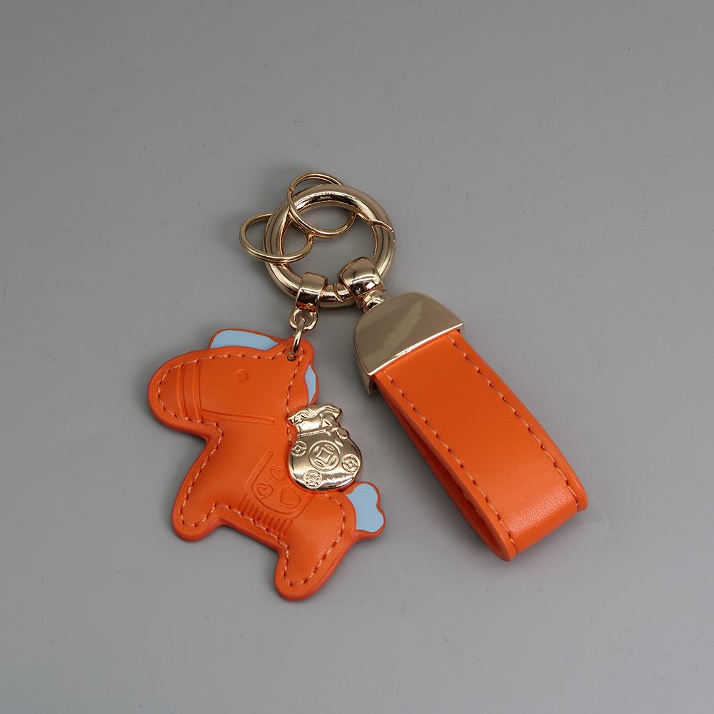 Instant Wealth Leather Keychain with Cartoon Pony Pendant for Couples – Trendy Bag and Car Accessory