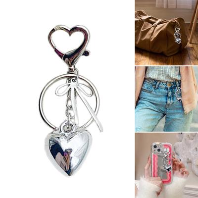 Elegancki wisiorek w kształcie serca z kokardką, wszechstronny brelok, modny dodatek dla kobiet, zawieszka do torebki, breloczek