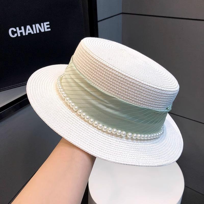 

Hat women 2025 new summer retro fashion pearl straw top hat travel seaside flat top celebrity style straw hat Adjustable