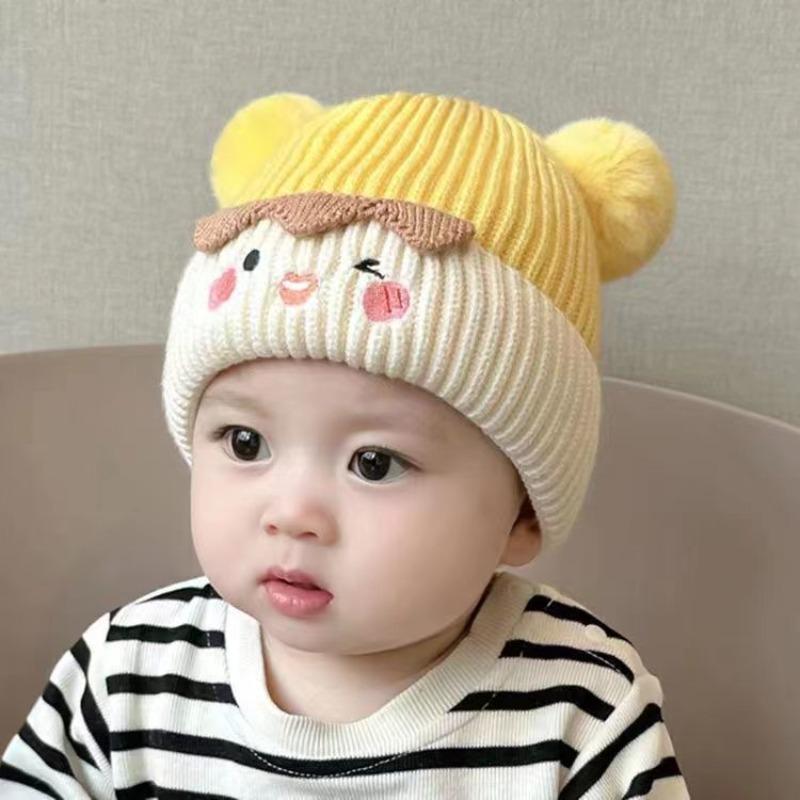 Baby autumn and winter cute cartoon warm hairball wool hat boys and girls baby ear protection hat children pullover knitted hat