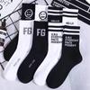 Zhuji Men's Autumn/Winter Mid-Tube Black & White Trendy Sports Socks - Breathable, Sweat-Absorbent, Long Tube for Basketball
