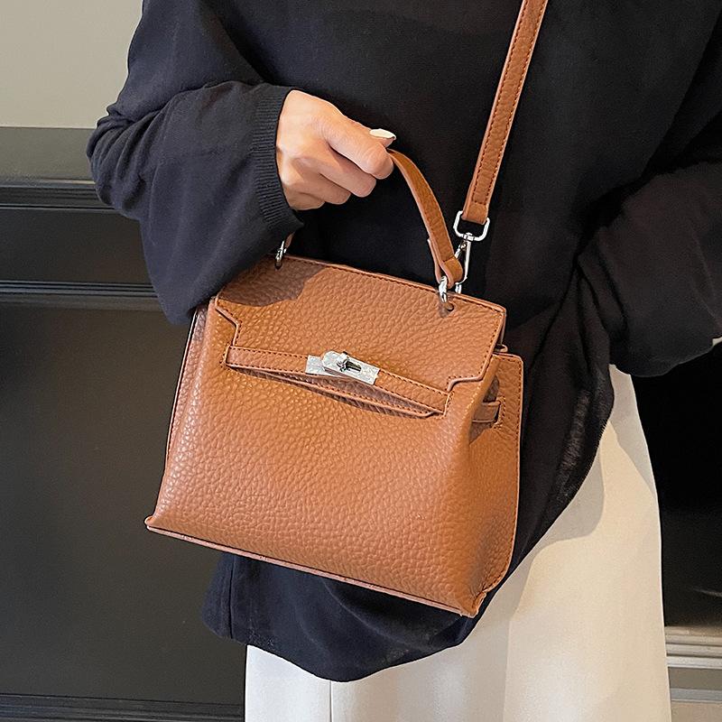 2025 new fashionable and simple commuter portable platinum bag women's temperament versatile lychee pattern texture messenger bag