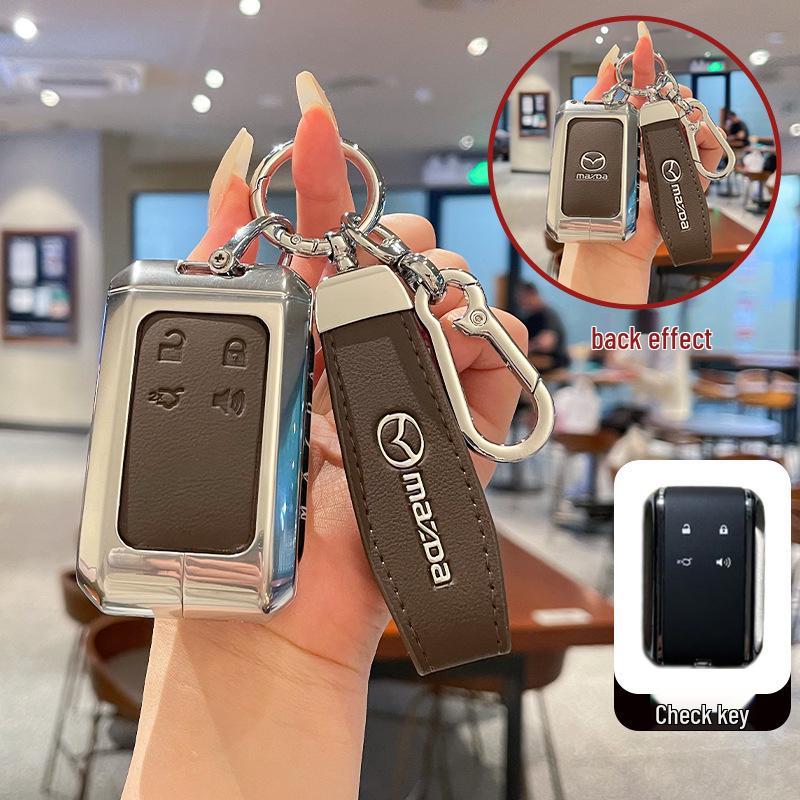Kuooo: Wear-resistant, fully enclosed Mazda EZ6 key fob and EZ60 car remote protective cases with buckle.