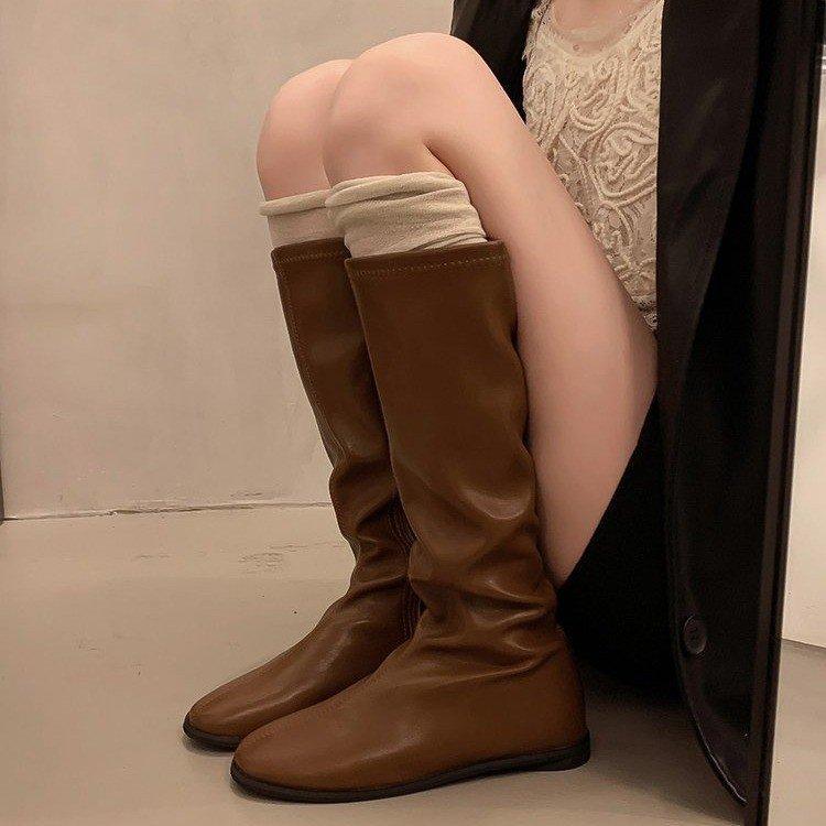 French niche long boots women's shoes 2025 new autumn and winter solid color thin but knee high knight boots