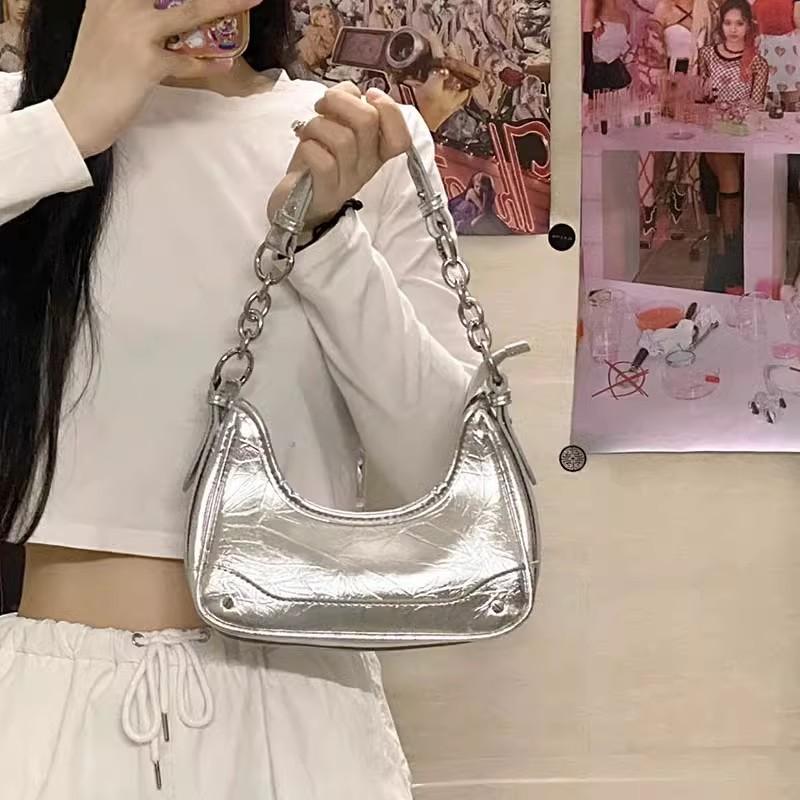 

Women s bag niche portable chain baguette underarm bag high-end versatile shoulder messenger bag срібний