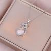Women's Influencer Necklace: Cat's Eye Stone Rotating Pendant with Clavicle Chain Design