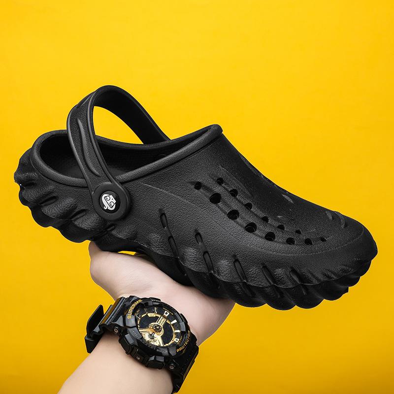 

Тапочки мужские летние сандалии Baotou hole мужские наступающие на дерьмо ощущения на улице нескользящие спортивные пляжные повседневные сандалии двойного назначения 45 чёрный